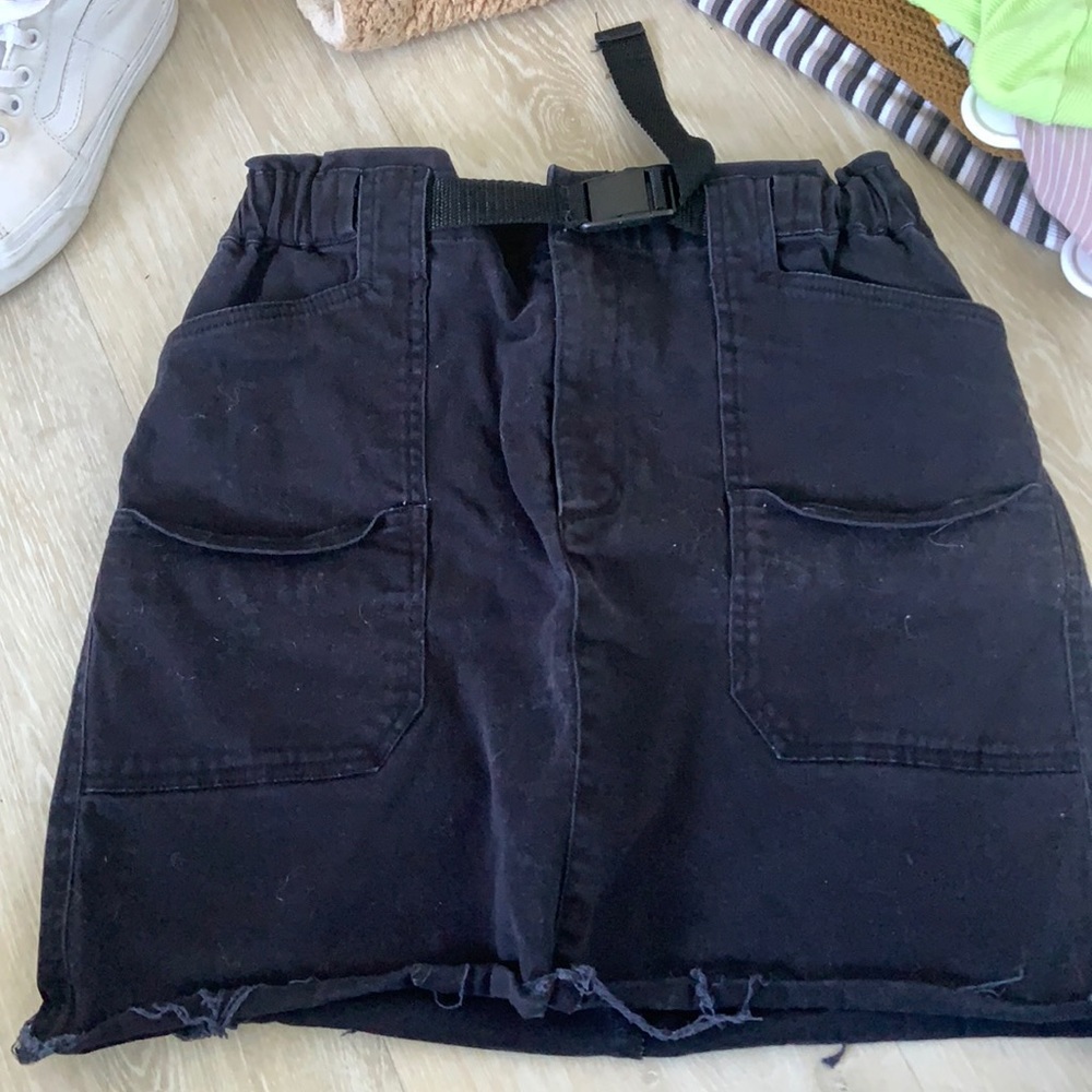 Black buckle mini skirt